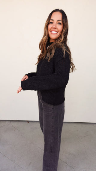Side view of Black Ribbed Knit Slouchy Sweater - COCO The Shop