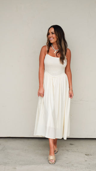 Natural Smocked Midi Dress dressed up with wedges for a summer wedding from COCO The Shop Dublin Ohio