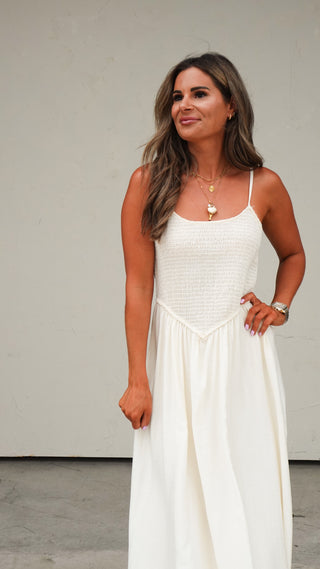 Close-up of the smocked bodice on the Natural Smocked Midi Dress from COCO The Shop boutique Columbus Ohio