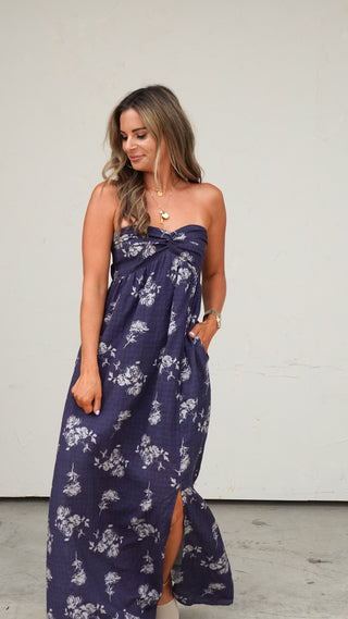 Close-up of the floral print on the Navy Floral Strapless Dress from COCO The Shop boutique Dublin Ohio