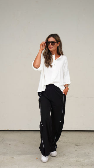 Black Nylon Track Pants worn for a coffee run outfit, women's athleisure from COCO The Shop Dublin Ohio