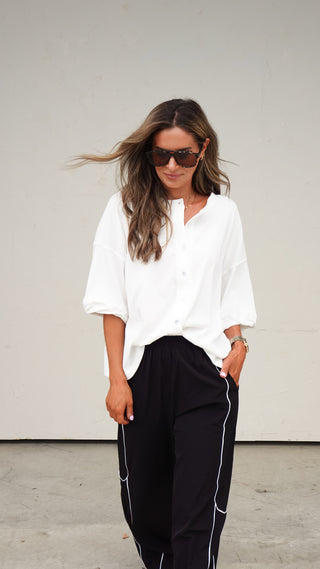 White Button-Front Short Sleeve Top paired with linen pants, women's boutique top from COCO The Shop Columbus Ohio