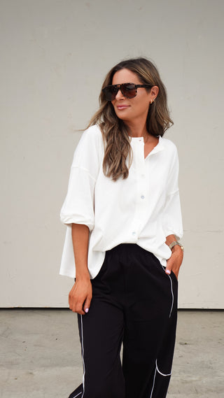 White Button-Front Short Sleeve Top styled with denim shorts, women's top from COCO The Shop Columbus Ohio