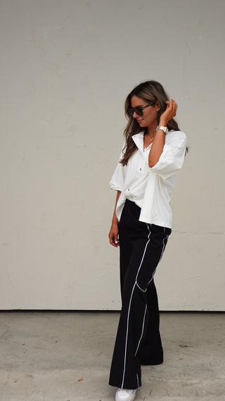 Back view of the Black Nylon Track Pants, sleek women's pants from COCO The Shop Dublin Ohio boutique