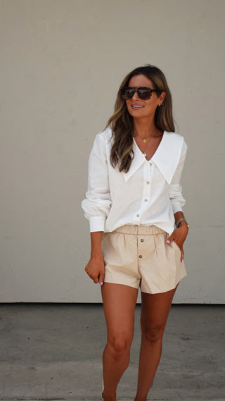 Tan Fold-Over Waist Shorts worn low for a relaxed look, women's boutique shorts from COCO The Shop Dublin Ohio
