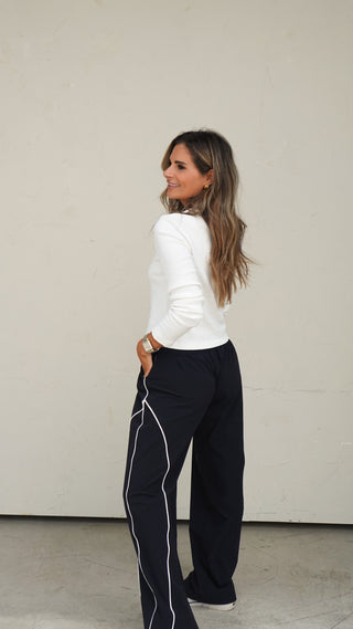 Women's off-white long sleeve crewneck basic top for everyday layering